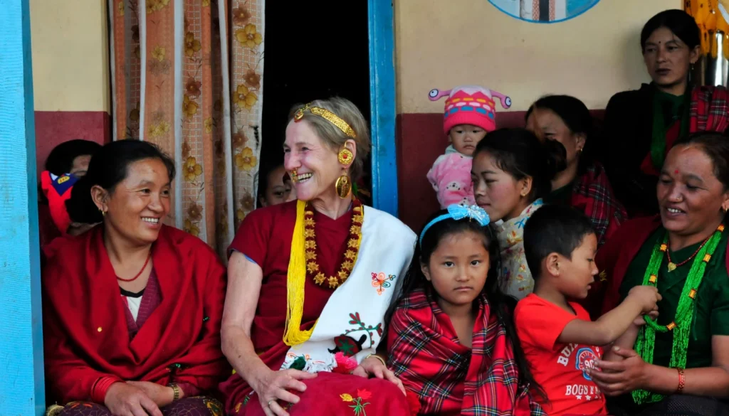 trekker sharing traditions with local women group
